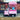 Pink ice cream tuk-tuk with 'Booja Events' branding in front of a brick building.