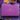 Large Purple Box of Booja-Booja Chocolate Truffles with the title The Signature Collection on a purple background, surrounded by decorative items. 