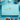 Large box of Booja-Booja Chocolate Salted Caramel Chocolate Truffles on a blue background surrounded by chocolate truffles, ingredients and decorative items. 