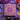 Booja-Booja chocolate trufflegift box with decorative design and the title A Grand Adventure, on a purple background with ingredients around it.