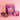 Booja-Booja Raspberry Scrunch Chocolate Wonders pack on a pink background with Chocolate Wonders and flowers.